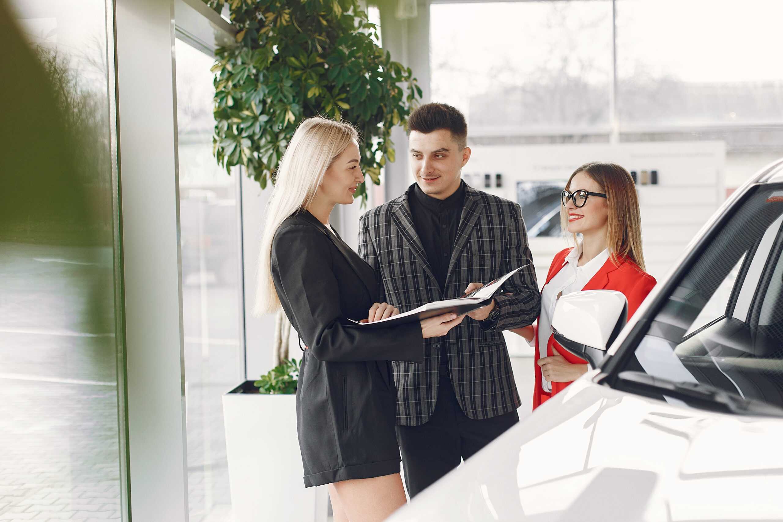 Cheap car rental Abu Dhabi economy car driving on Corniche road